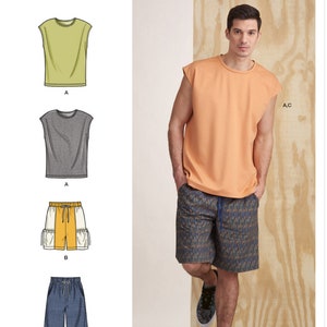 May include: Simplicity sewing pattern S9314 for a sleeveless top and shorts. The pattern includes three different styles for the top and two different styles for the shorts. The top is shown in a light orange color and the shorts are shown in a blue and green camouflage pattern.