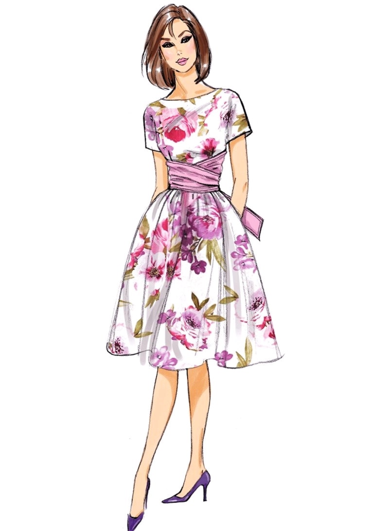 May include: A white dress with a floral print and a pink sash. The dress has a fitted bodice and a full skirt. The model is wearing purple heels.