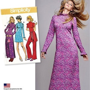 May include: Simplicity 8256 vintage sewing pattern. The image features a woman in a long, floral print dress with a high neckline and flared sleeves. The pattern envelope shows illustrations of dresses and a pantsuit. The text "Simplicity" and "1970s Vintage" are visible.