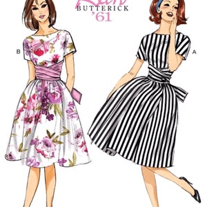 May include: A sewing pattern for a dress with two different styles. The first style is a floral print dress with a pink sash. The second style is a black and white striped dress with a black sash. The pattern number is B6318.  The text "Butterick Retro '61" is also included.