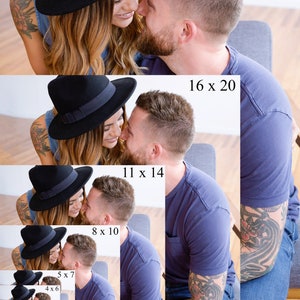 May include: A couple in love, looking at each other with affection. The woman is wearing a black fedora hat and a denim shirt. The man is wearing a blue t-shirt and jeans. He has a tattoo on his arm.