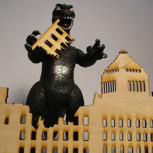 Cortó con láser tu propio Godzilla Kaiju Display Crushed Buildings Tokyo