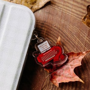 Lost in Translation Typewriter E-Reader Charm | Dust Plug Reader Gift