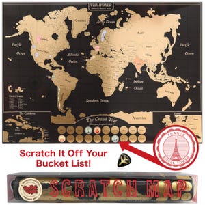 May include: A black and gold scratch-off world map featuring the text THE WORLD, The Grand Tour, and Scratch It Off Your Bucket List. The map includes a black guitar pick-shaped scratching tool and a cylindrical clear plastic storage tube.