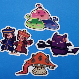 May include: Five colorful stickers featuring cartoon characters. A green, blue, and pink slime character, a purple devil character with a pitchfork, a red and orange mushroom character, and two people in traditional Chinese clothing.