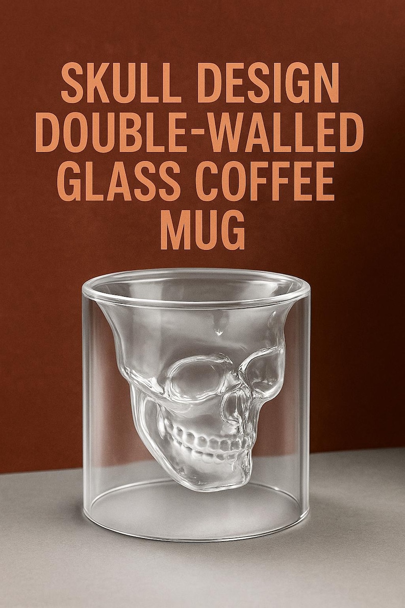 May include: Clear double-walled glass coffee mug with a skull design. The skull is molded into the inner wall of the glass. The text "SKULL DESIGN DOUBLE-WALLED GLASS COFFEE MUG" is printed in orange.