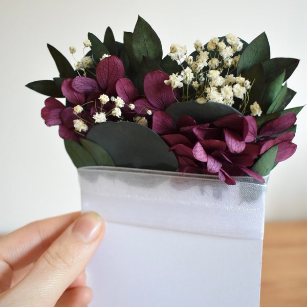 Eucalyptus, hydrangea and gypsophila pocket boutonniere