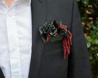 Black and burgundy pocket boutonniere