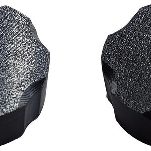 May include: Two black plastic knobs with a textured surface. The knobs have a hexagonal shape with six sides.