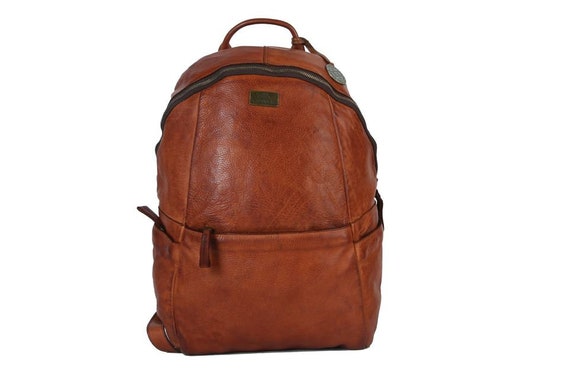 designer brown leather mens backpack Womens Rucksack Purse Upgrade your style with the Liberty Mens Leather Backpack from Von Baer Men's Convertible Backpack Full-Grain