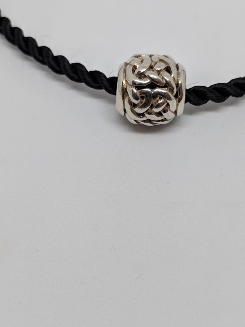 Silver Celtic Knot Bead Barrel on Black Satin Cord