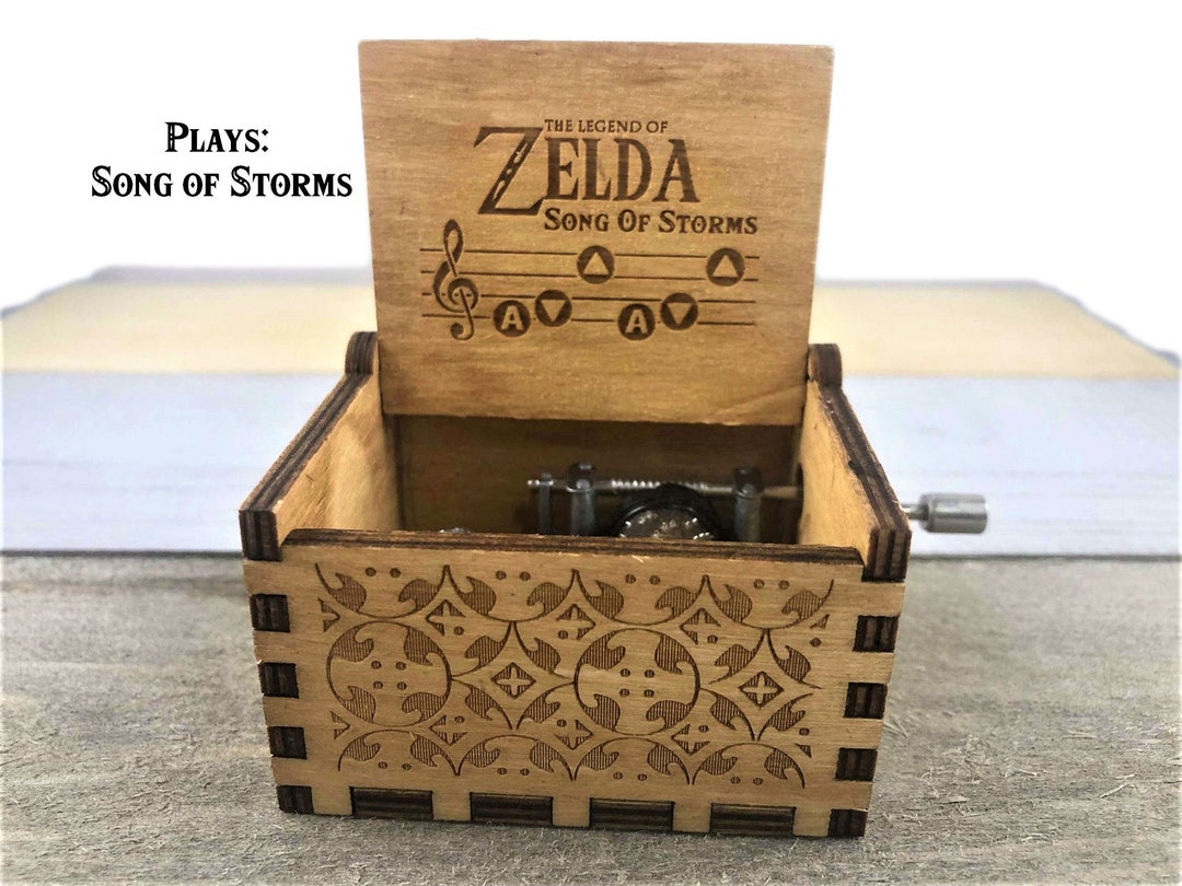  The Legend of Zelda Music Box Hand Crank Musical Box Carved  Wooden,Play Zelda:Song of Storms from Ocarina of Time,Brown : Home & Kitchen