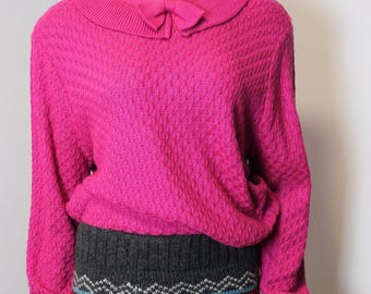 Pink women’s vintage pull over sweater with bow at neckline collar