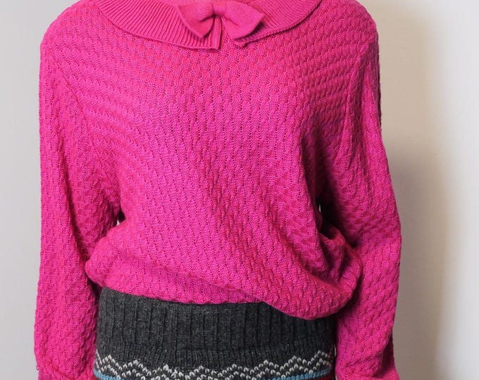Pink women’s vintage pull over sweater with bow at neckline collar