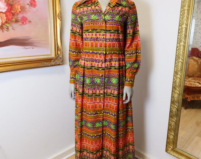 Vintage women's 1970's maxi dress with dagger collar and bold print by Alex Colman California