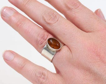 Mid century sterling ring with amber stone