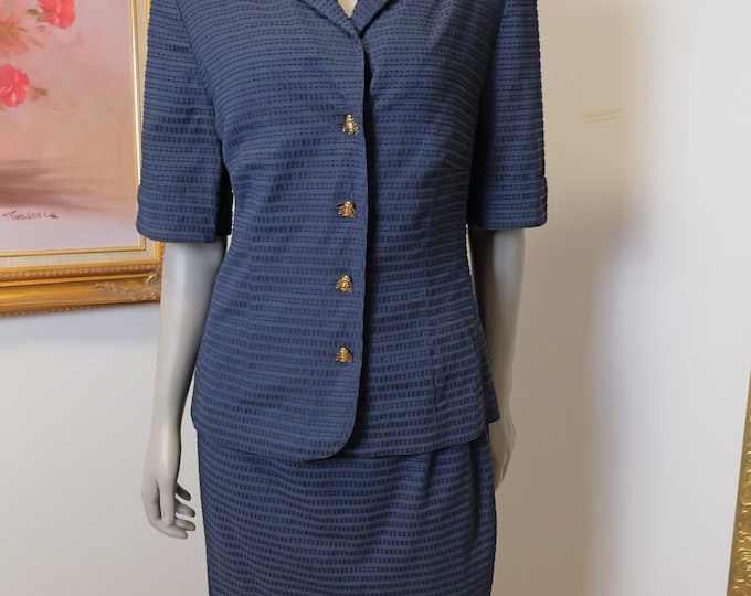 Vintage women’s 1990’s skirt suit with short sleeve blazer and gold Bubble Bee Buttons