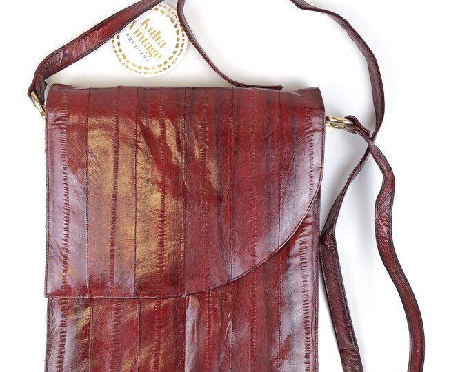 Vintage women’s burgundy Eel skin cross body shoulder bag