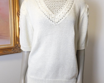 1980’s women’s white short sleeve sweater with neckline cut out details and slightly puffed sleeve / Magnoloa Sweater Made In Hong Kong