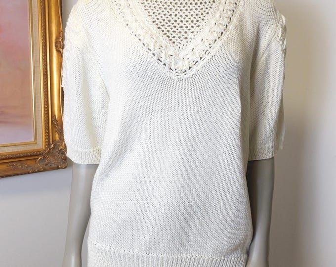 1980’s women’s white short sleeve sweater with neckline cut out details and slightly puffed sleeve / Magnoloa Sweater Made In Hong Kong