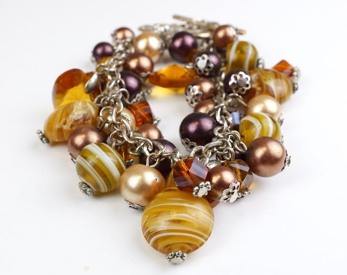 Vintage glass beaded bracelet in gold and amber tones