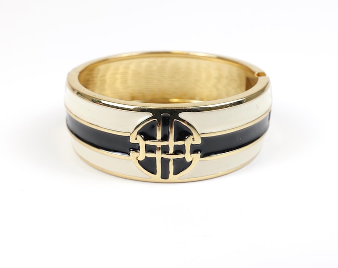 Preppy black enamel and gold clamper style bangle cuff bracelet circa 1980's