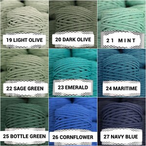 May include: A grid of nine spools of braided cord in various colors, each with a white label. Colors include 19 Light Olive, 20 Dark Olive, 21 Mint, 22 Sage Green, 23 Emerald, 24 Maritime, 25 Bottle Green, 26 Cornflower, and 27 Navy Blue.