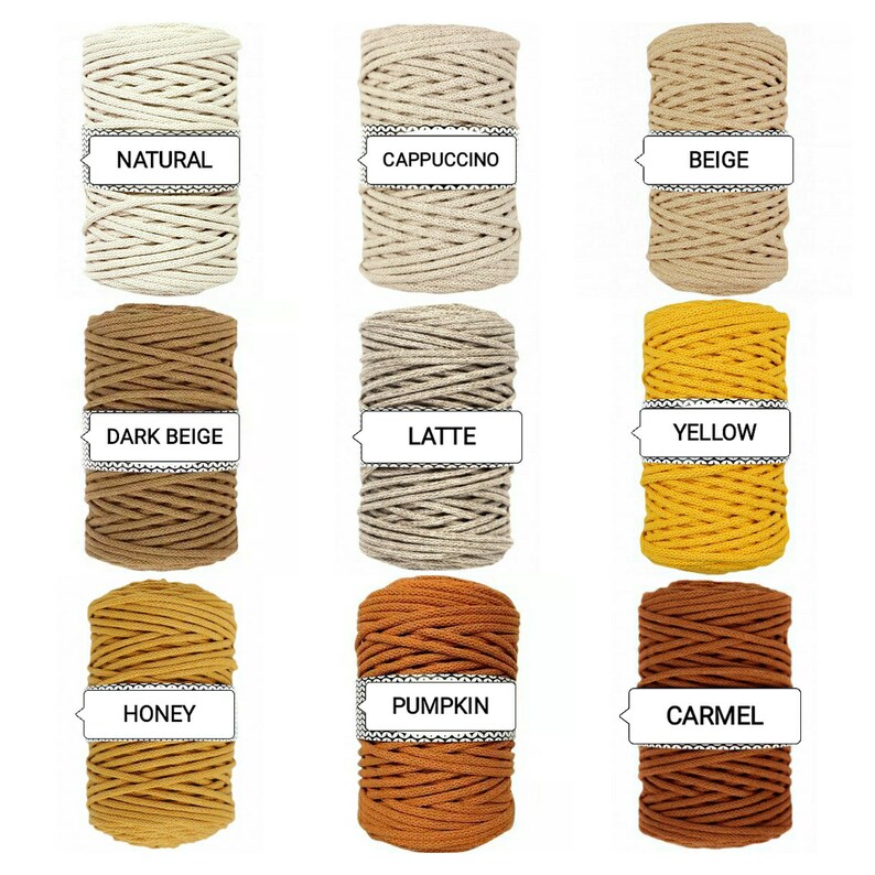 May include: Nine spools of cotton rope in various colors, including natural, beige, dark beige, yellow, honey, pumpkin, latte, cappuccino, and caramel. Each spool has a label with the color name.