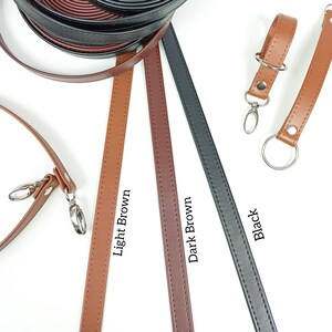 May include: Three leather straps in light brown, dark brown, and black. Each strap has stitching along the edges. The straps are laid out on a white surface. The text "Light Brown", "Dark Brown", and "Black" is written below each strap.