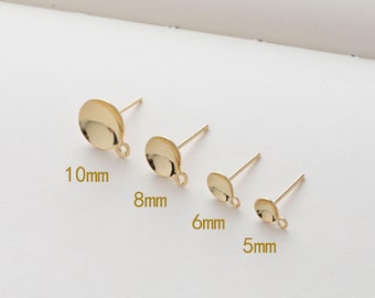 May include: Four gold-toned earring posts with round, flat tops. The posts are arranged in order of size, from largest to smallest. The sizes are labeled 10mm, 8mm, 6mm, and 5mm.