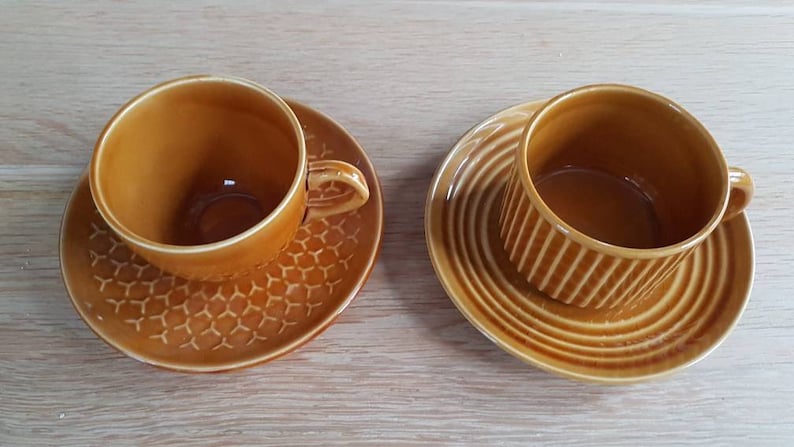 Set of 2 attractive Midcentury ceramic cup and saucers in a light brow-ocher colour glazing.