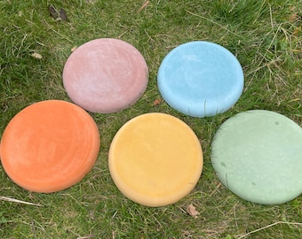 Set of five circular stepping stones in various colours
