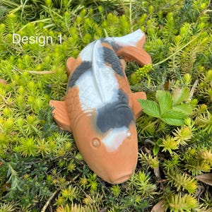 Koi carp fish garden pond ornaments in various colours. perfect gift for fish lover.