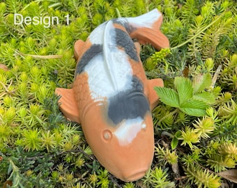 Koi carp fish garden pond ornaments in various colours. perfect gift for fish lover.