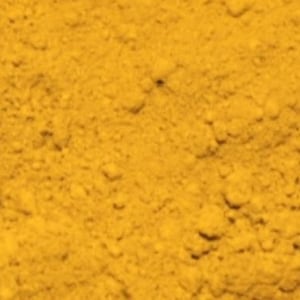 May include: A close-up of a pile of bright yellow turmeric powder.