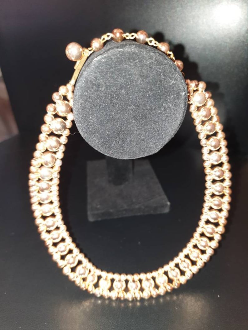 Vintage 1950s gold tone lucite beadsbeaded necklace.