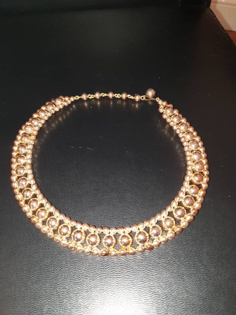 Vintage 1950s gold tone lucite beadsbeaded necklace.