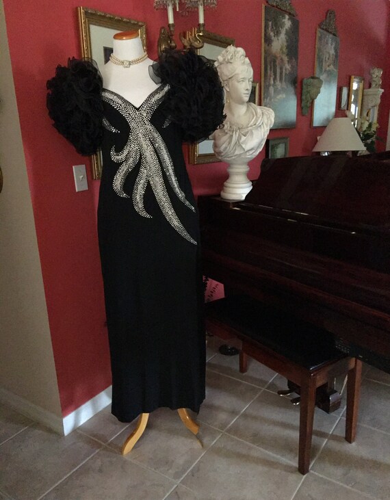 Regal black knit and beaded evening gown. Multi ru
