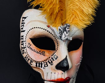 Available. Masquerade mask with feathers. Carnival mask.Skull mask.