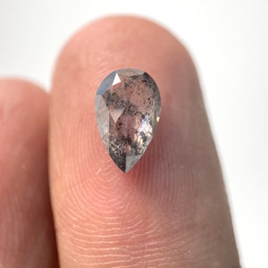 May include: A handmade wooden sign with the text "Welcome" in a playful font. The sign features a distressed white background and a dark brown frame, perfect for a front door or entryway.