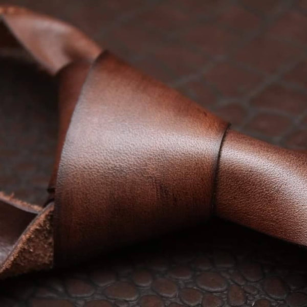 Leather tie.. bowtie