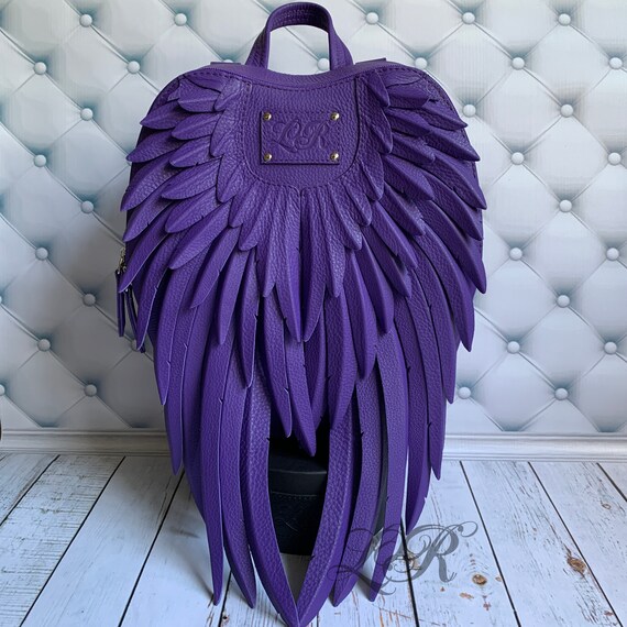 purple leather backpack