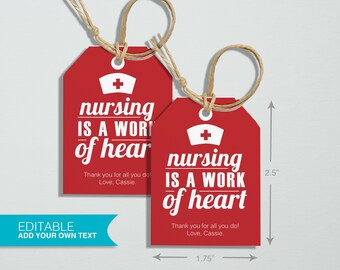May include: Two red gift tags with white text that reads "nursing is a work of heart" and a red cross symbol. The tags are 6.35 cm tall and 4.45 cm wide. The text "Thank you for all you do! Love, Cassie." is printed below the main text.