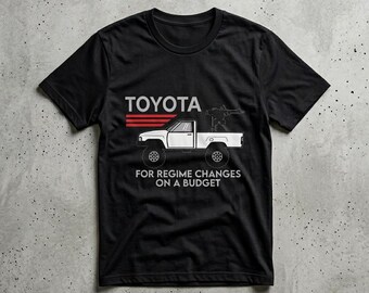 Toyota pickup with mounted gun T-Shirt | For regime changes on a budget
