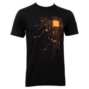 May include: Black t-shirt with an orange circuit board design. The design features a central processor chip and connecting lines.