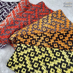 May include: Four knitted scarves in a variety of geometric patterns. The scarves are in shades of orange, yellow, black, and gray.