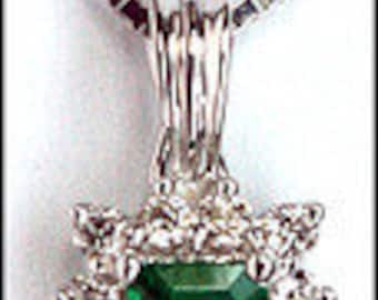 Emerald .69ct Pendant in 18kt White Gold, .21ct Diamond