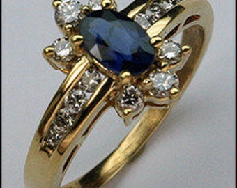 Sapphire .56ct Ring with .48ct Diamonds in Yellow Gold