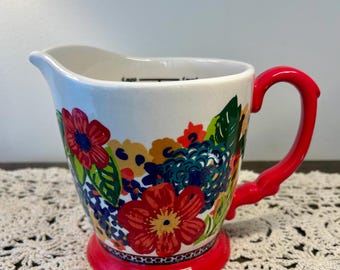 The Pioneer Woman 4 Cup Measuring Pitcher. Richly colorful Breezy Blossom pattern.