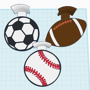 May include: Three sports balls: a black and white soccer ball, a brown and white football, and a white baseball with red stitching.